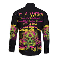 Black long-sleeve button shirt with colorful back graphic and skull illustration
