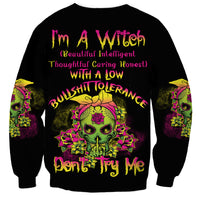 Black sweatshirt with colorful skull graphic and bold front text