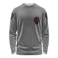 Long-sleeve dark gray shirt with small red claw-style graphics on chest and sleeves.