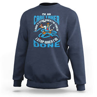 Navy sweatshirt with caregiver motivational graphic on the chest