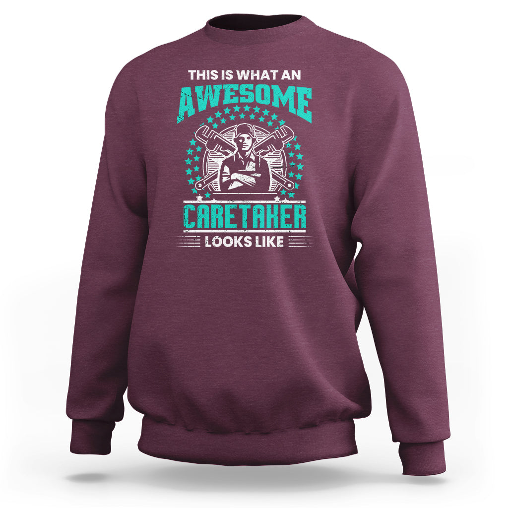 Maroon sweatshirt with teal "Awesome Caretaker" graphic and "Looks Like" text