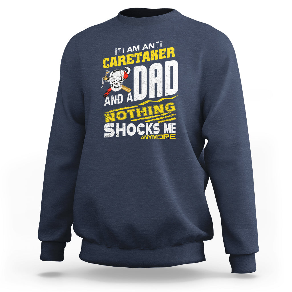 Navy sweatshirt with colorful 'Caretaker Dad' novelty slogan graphic