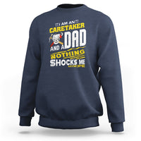 Navy sweatshirt with colorful 'Caretaker Dad' novelty slogan graphic