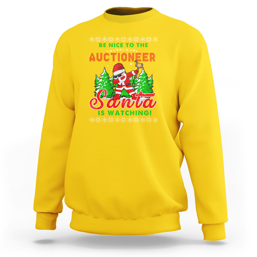 Daisy yellow crewneck sweatshirt with holiday Santa graphic reading “Santa is watching”.