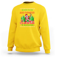 Daisy yellow crewneck sweatshirt with holiday Santa graphic reading “Santa is watching”.