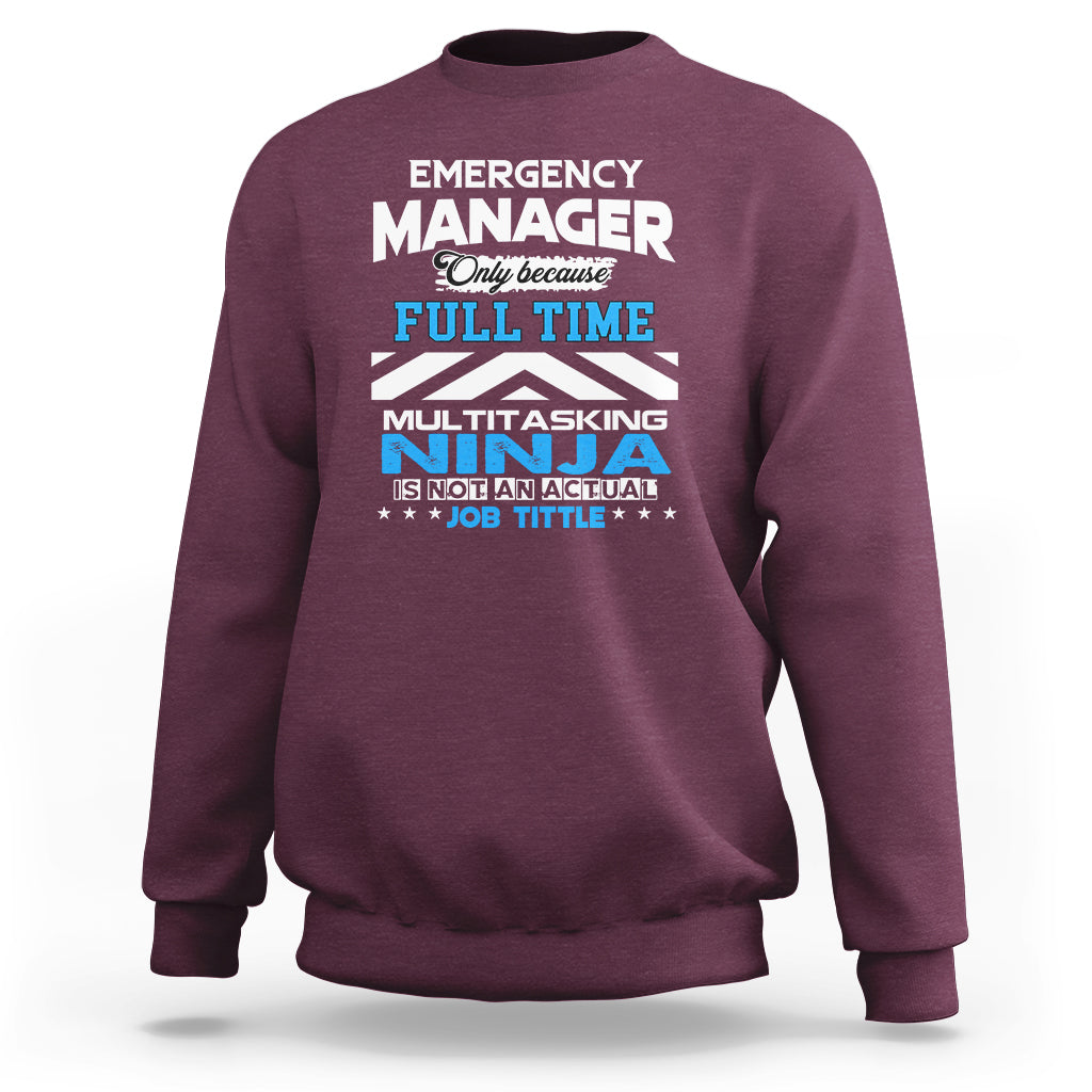 Maroon crewneck sweatshirt with "Emergency Manager" "Ninja" text graphic on the front
