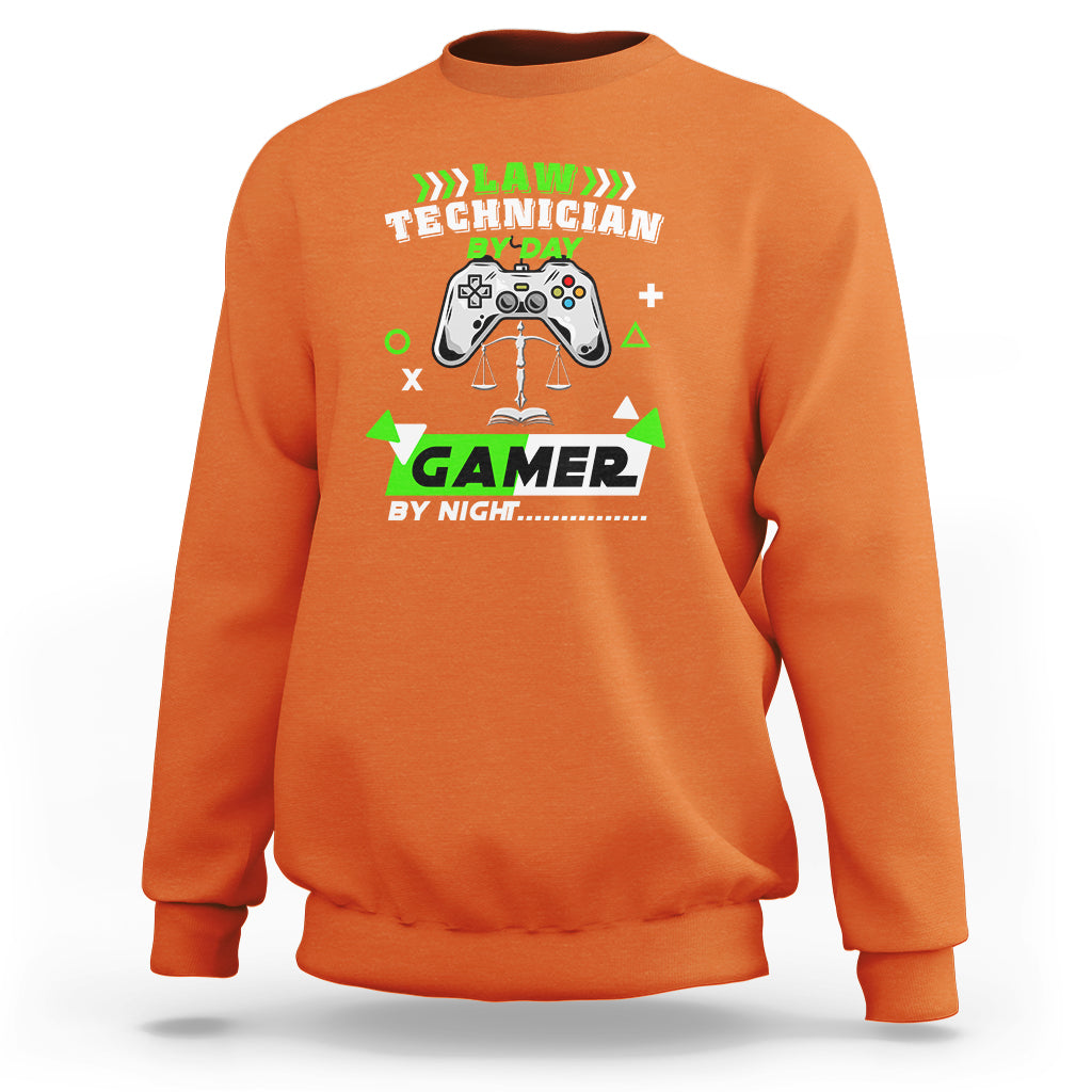 Orange crewneck sweatshirt with controller law technician graphic, long sleeves.