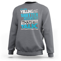 Charcoal crewneck sweatshirt with colorful 'Shutter Driver' 'That's how we talk' print
