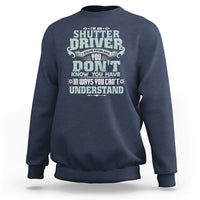 Navy crewneck sweatshirt with large front “Shutter Driver” graphic print.