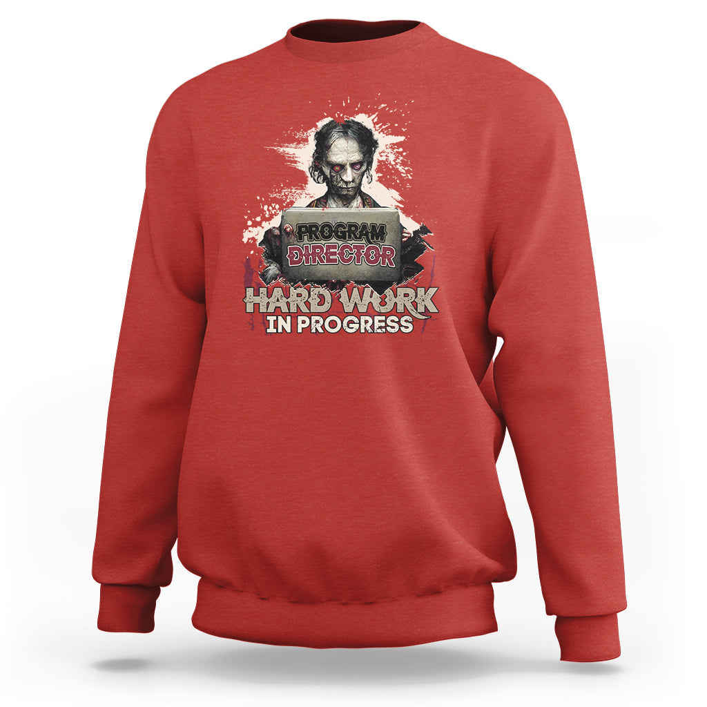 Red crewneck sweatshirt with 'Program Director' and 'Hard Work In Progress' graphic