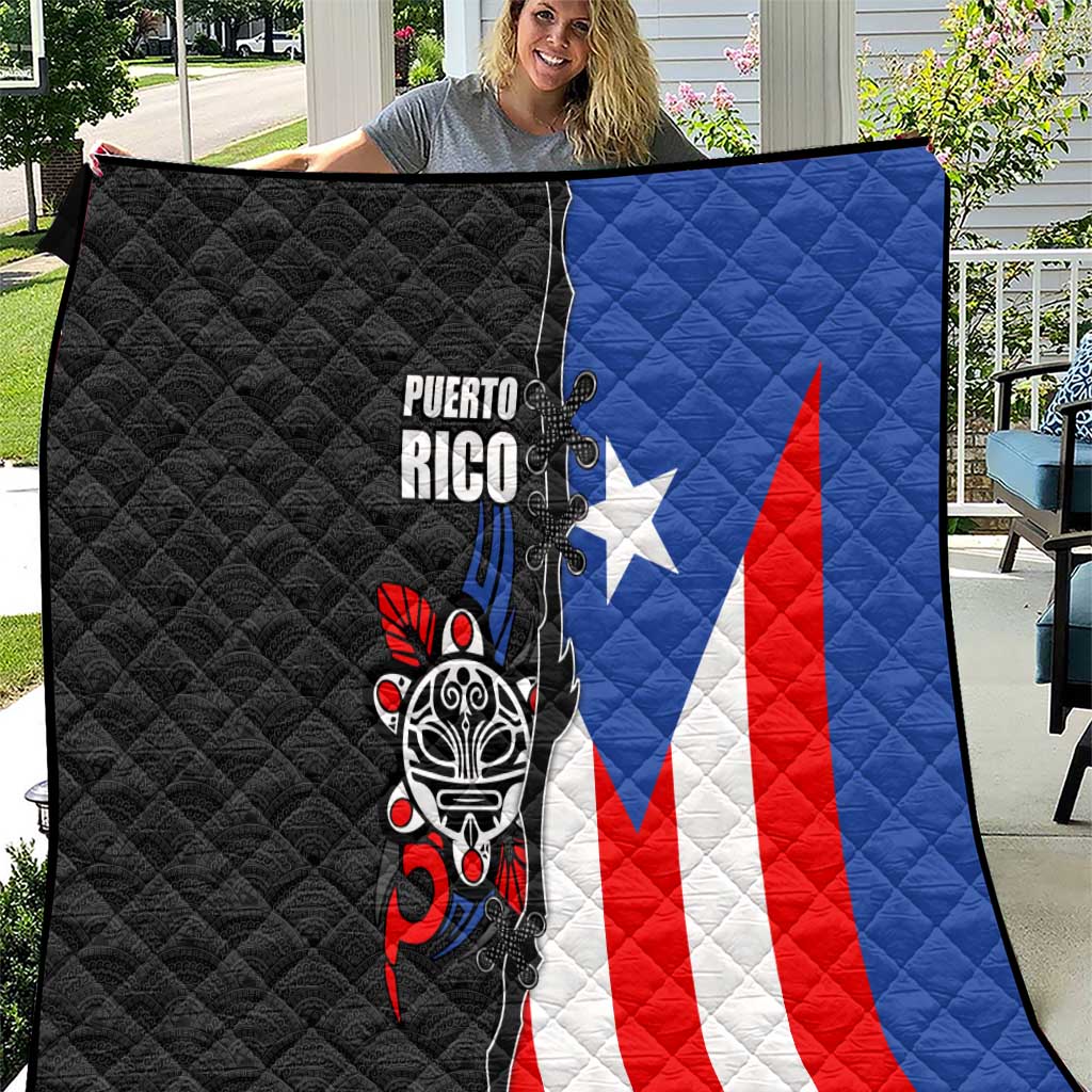 Puerto Rico quilt with tribal sun figure and flag colors; black, blue, red, white