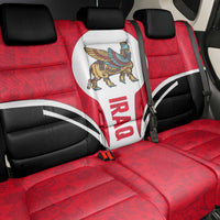 Red back seat cover with black trim and white insert featuring Iraq lamassu creature