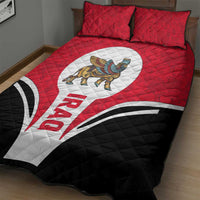 Red quilt bed set with large winged creature emblem and black quilted lower section