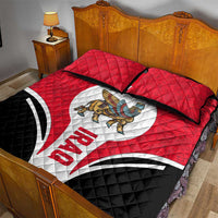 Red quilt bed set with winged creature emblem, IRAQ text, and black accent panel