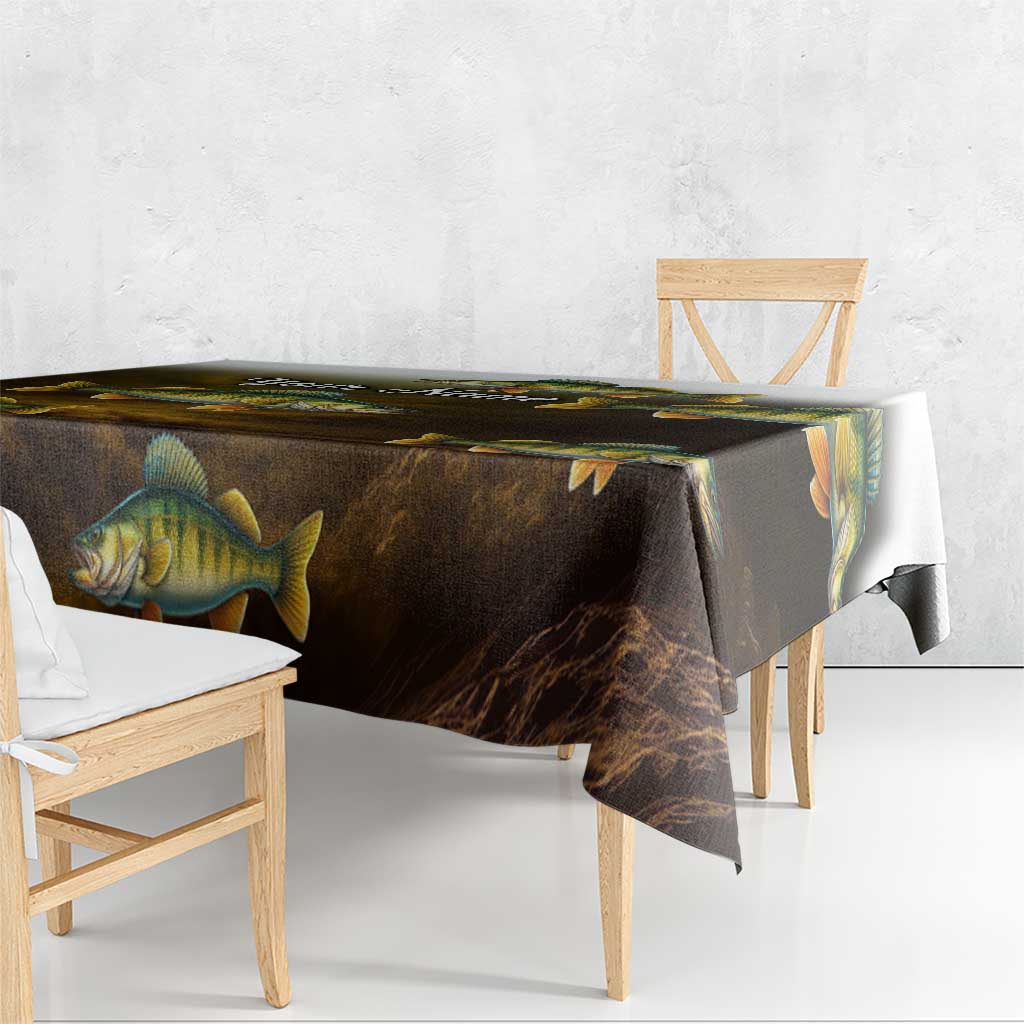 Walleye fish print tablecloth with dark background and green-yellow scale detail, corner view.