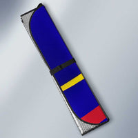 Folded car windshield sun shade with blue, red, yellow stripe pattern