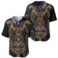 Two black short-sleeve baseball jerseys with gold Viking skull and chain graphics