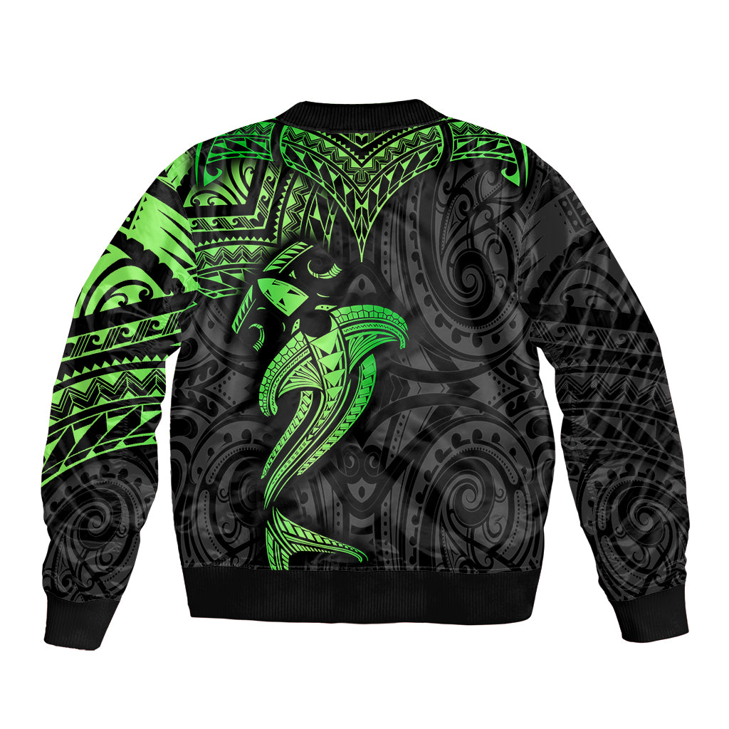 Black bomber jacket back with green tribal shark graphic, ribbed collar and hem