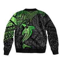 Black bomber jacket back with green tribal shark graphic, ribbed collar and hem