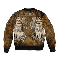 Unisex bomber jacket, back view; dark yellow with white ravens, forest scene, and runes