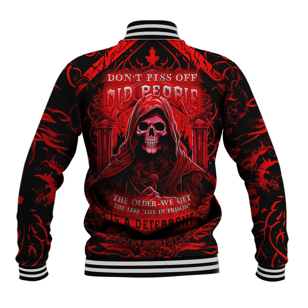 Red and black baseball jacket with skull graphic and striped ribbed collar cuffs
