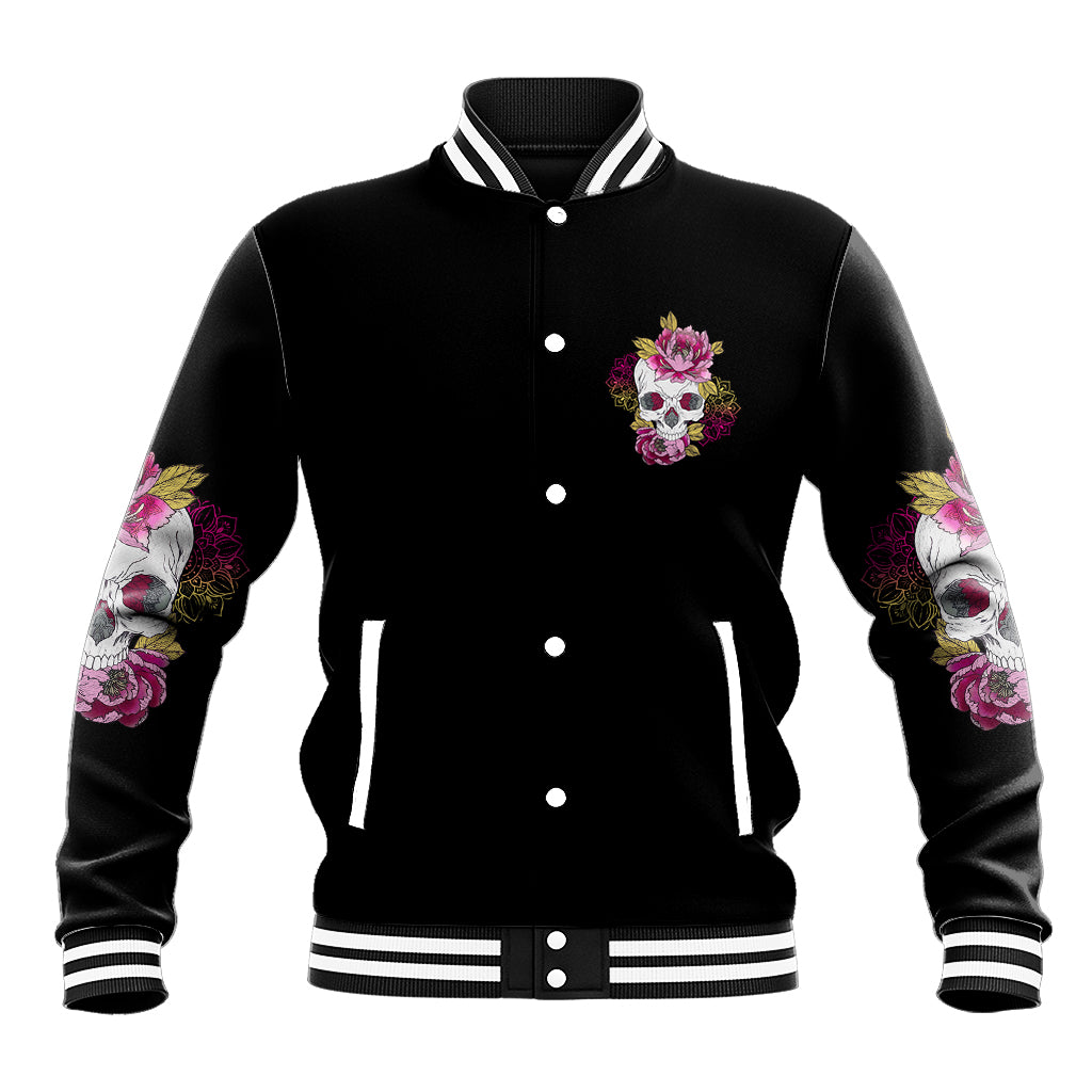 Black varsity jacket with button front, striped collar, floral skull patch on chest and sleeves