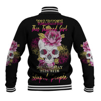 Black baseball jacket with multicolor skull and floral back print, striped rib collar and cuffs