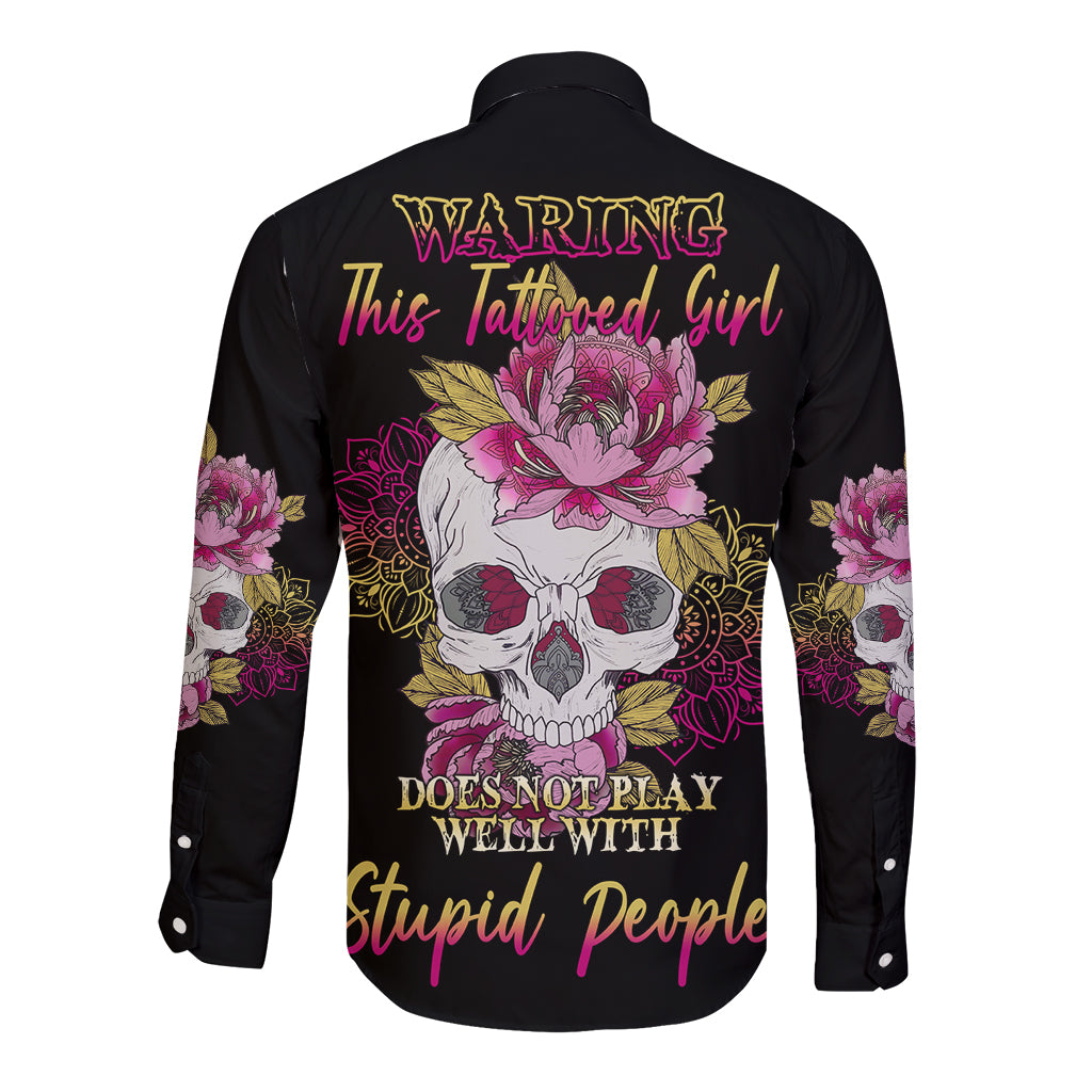 Black long-sleeve button shirt with colorful skull and floral graphic on back