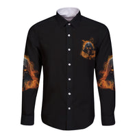 Long sleeve button shirt, black front with small storm skull graphic and flame sleeve print