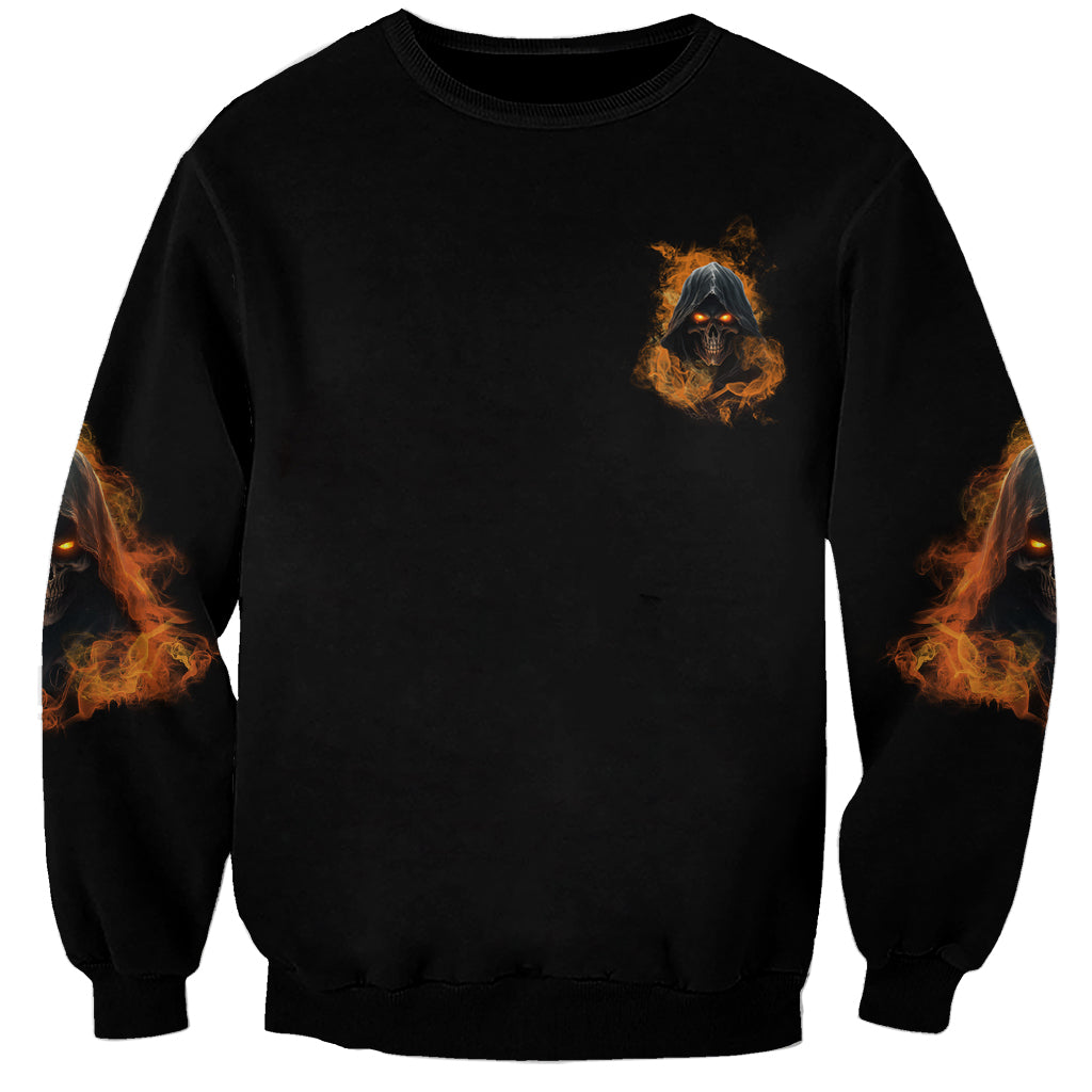 Black unisex sweatshirt with small skull-in-flames chest logo and flame sleeve print