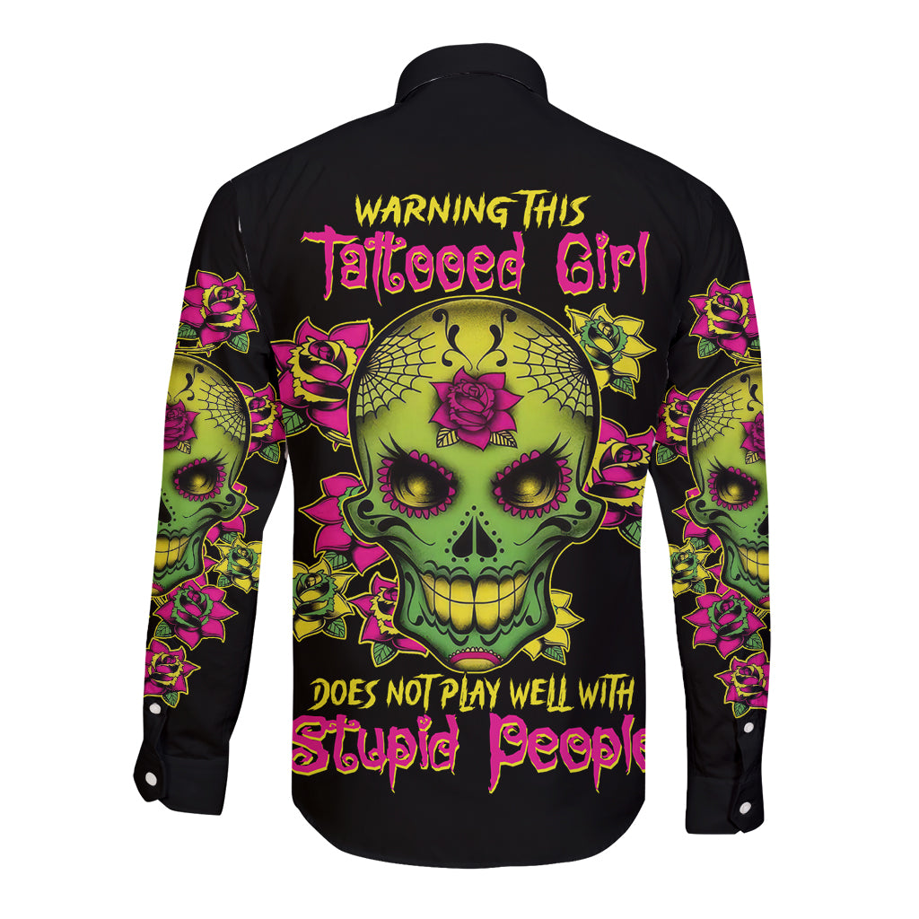 Black long-sleeve button-up shirt with large neon skull and rose tattoo graphics on back