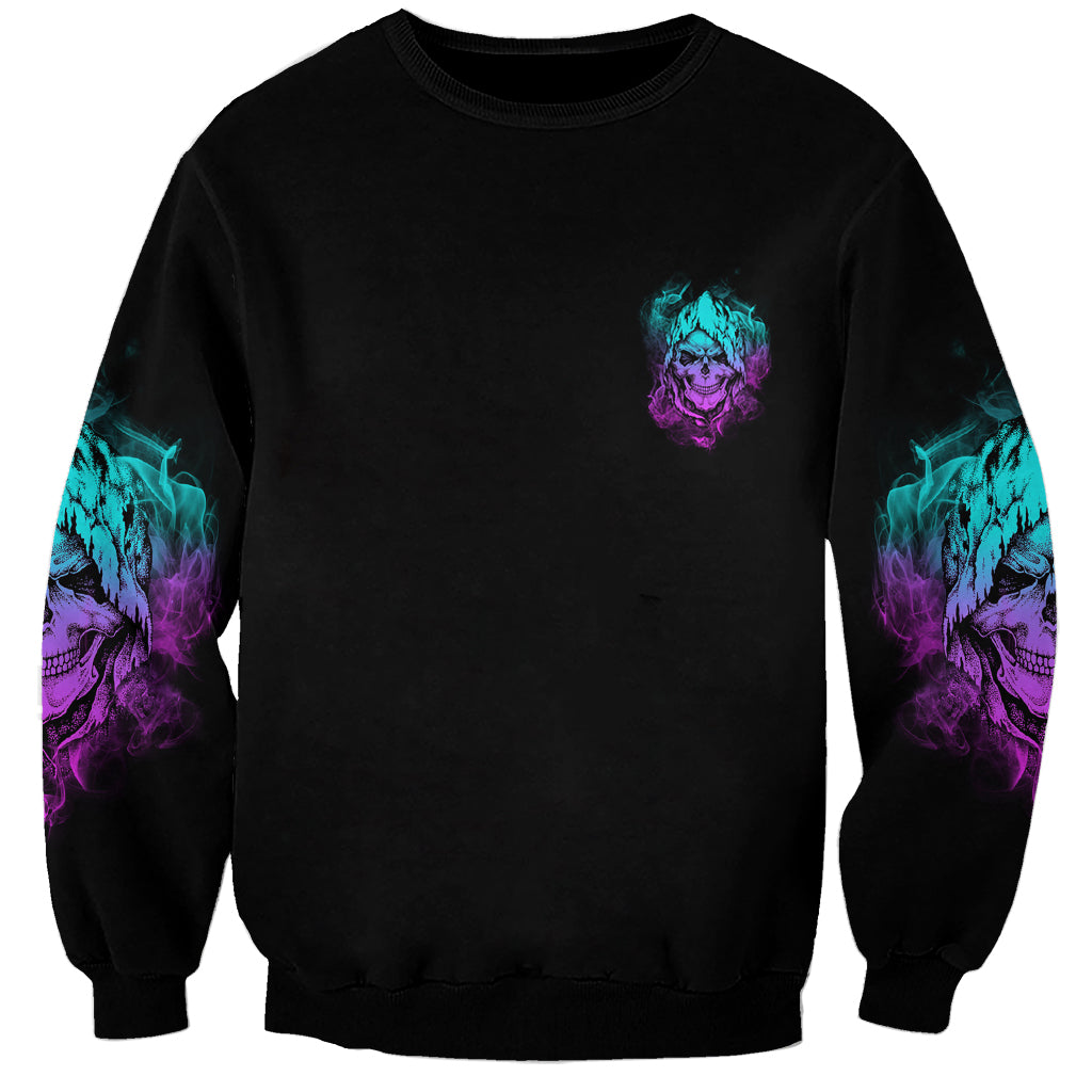Black unisex sweatshirt with small neon skull chest print and sleeve graphics