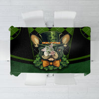 Green and black patterned tablecloth with rabbit portrait and clover-style accents