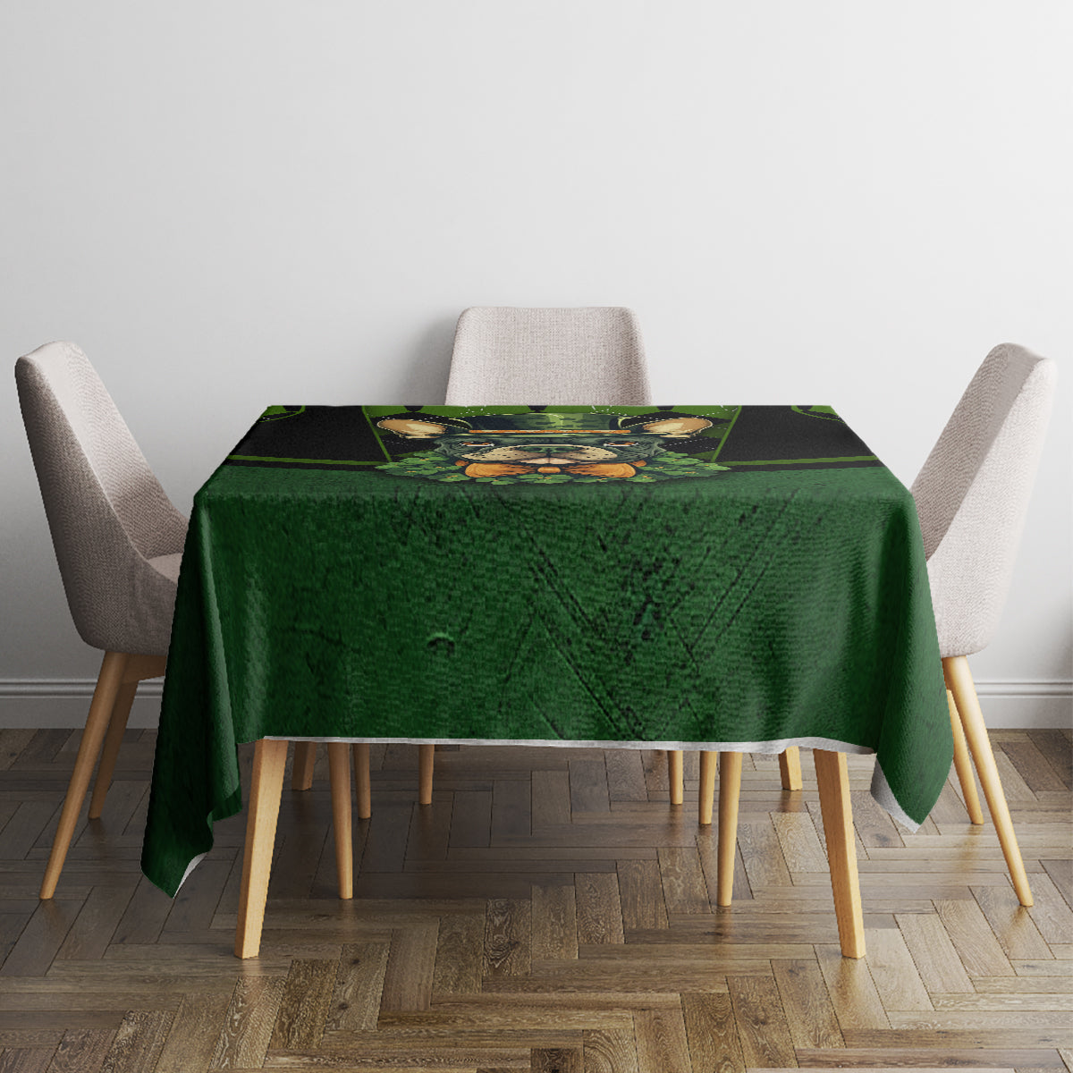 Square green tablecloth with black plaid bands and rabbit illustration on top