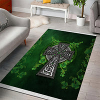 Green rectangular rug with Celtic Irish cross design and clover floral accents, white border