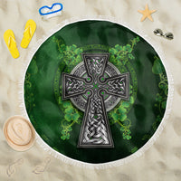 Round green beach blanket with Celtic cross and shamrock floral, white fringe edge