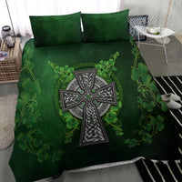 Green bedding set with large Celtic cross and clover vine graphics, two pillow shams