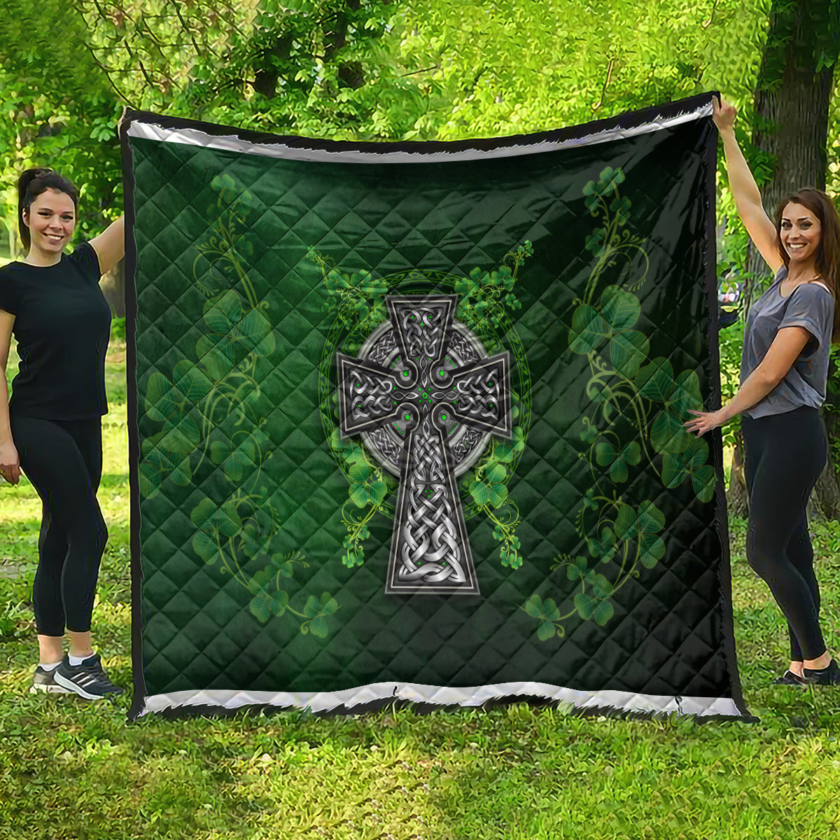 Dark green quilt banner with Celtic cross center design and shamrock floral clover print
