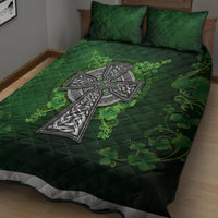 Green quilt and sham set with celtic cross centerpiece and clover vine accents