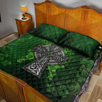 Green bed quilt set with two quilted pillow shams and centered celtic cross design