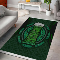 Green Celtic knot area rug with black corner accents and circular emblem design