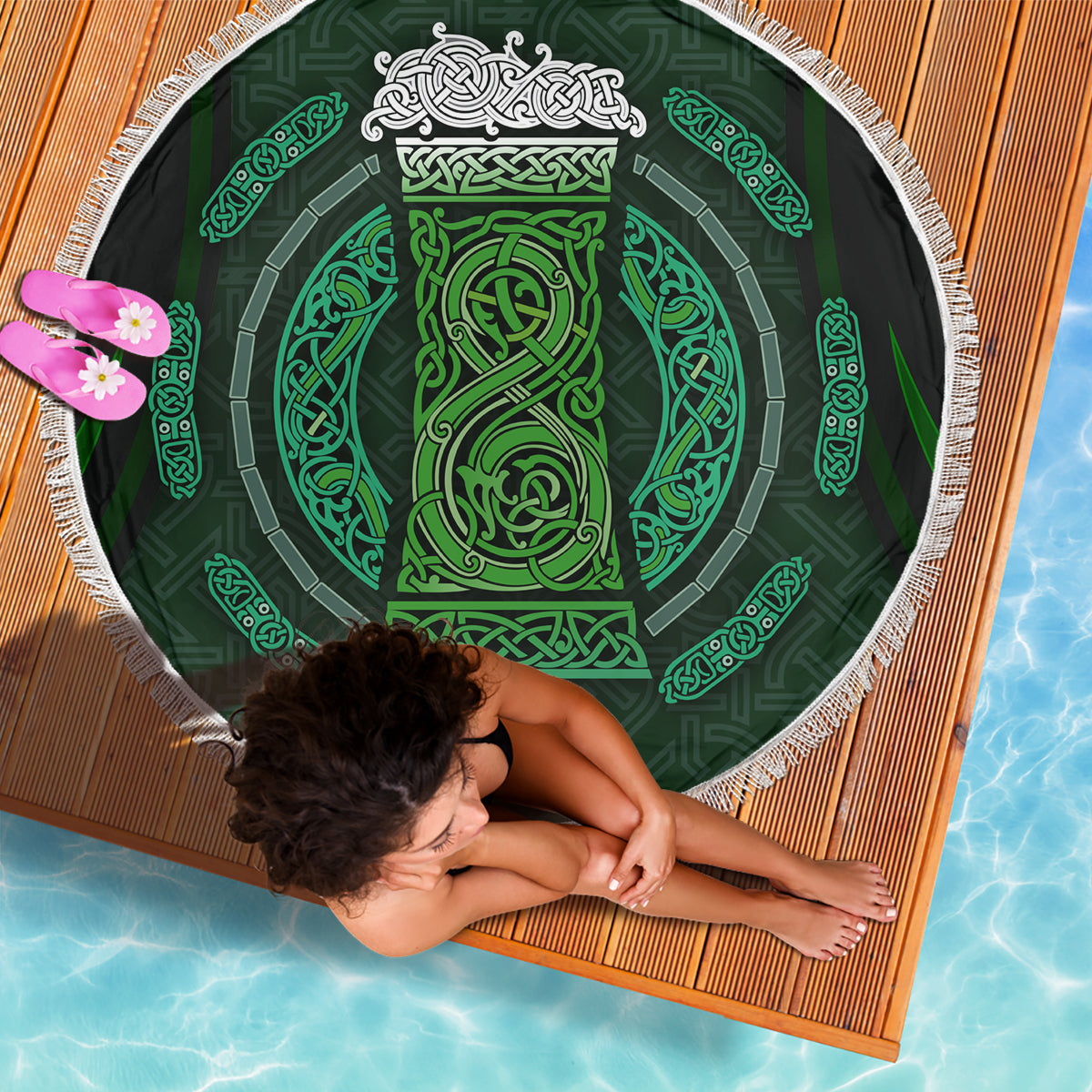 Round beach blanket featuring dark green and black Celtic medallion circle with fringe