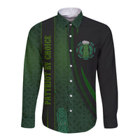 Long-sleeve button shirt with green patterned front, vertical text, and chest crest