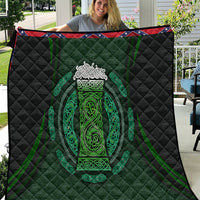 Black and green Celtic circle quilt with intricate neon-style pattern, quilted diamond texture