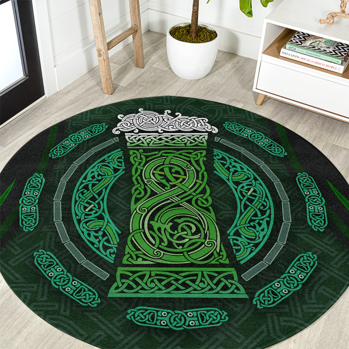 Round green rug with Celtic circle pattern and dark center medallion