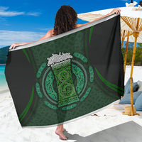 Green sarong with Celtic circle graphic and intricate green pattern, black base