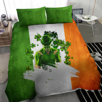 Green and orange bedding set with leprechaun, white center stripe, and clover designs