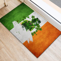 Angled rubber doormat with Irish tricolor print: green, white, orange with clovers and man