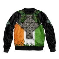 Black bomber jacket with Irish flag panel, Celtic cross and shamrock graphics, ribbed hem