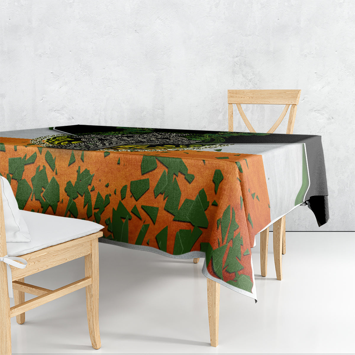 Irish-themed tablecloth with orange and green shamrock pattern and black Irish cross border.